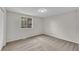 Bedroom featuring plush carpeting and a window offering natural light at 3414 Dearwood Sw Dr, Lilburn, GA 30047