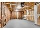 Spacious garage interior featuring a concrete floor, insulation and drywall, offering ample storage and parking at 3414 Dearwood Sw Dr, Lilburn, GA 30047
