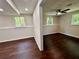 View of multiple rooms showcasing wood-look floors, fresh paint and natural light at 3414 Dearwood Sw Dr, Lilburn, GA 30047