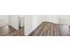 Functional laundry room with white appliances and wood-look flooring at 41 Bandimere Parkway, Dallas, GA 30157