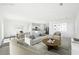 Cozy living space with modern furniture, decor, and an open layout leading to the kitchen at 41 Bandimere Parkway, Dallas, GA 30157