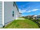 View of the fenced backyard featuring a concrete patio at 4420 Merrigold Way, Fairburn, GA 30213
