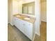 Bathroom featuring granite counters and double sinks at 4420 Merrigold Way, Fairburn, GA 30213