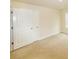 Bedroom featuring plush beige carpet and walls painted in soft eggshell color at 4420 Merrigold Way, Fairburn, GA 30213