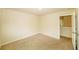 Bedroom featuring plush beige carpet and walls painted in soft eggshell color at 4420 Merrigold Way, Fairburn, GA 30213