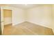 Bedroom featuring plush beige carpet and walls painted in soft eggshell color at 4420 Merrigold Way, Fairburn, GA 30213