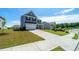 Two-story home showing the long driveway and spacious front yard at 4420 Merrigold Way, Fairburn, GA 30213