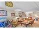 Basement living room with a jukebox, plush seating, and decorative lighting at 850 John Alden Rd, Stone Mountain, GA 30083