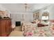 Spacious bedroom featuring twin beds, a ceiling fan, and closet storage space at 850 John Alden Rd, Stone Mountain, GA 30083