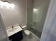 Modern bathroom featuring a glass-enclosed shower, stylish vanity, and contemporary finishes at 962 Bibbs Circle Nw # 6, Atlanta, GA 30318