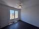 Bright bedroom featuring hardwood floors, neutral walls, and ample natural light at 962 Bibbs Circle Nw # 6, Atlanta, GA 30318