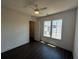 Spacious bedroom features wood floors, ceiling fan and natural light from the double window at 962 Bibbs Circle Nw # 6, Atlanta, GA 30318