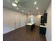 Bright kitchen and living area with stainless steel appliances, kitchen island, and open floor plan at 962 Bibbs Circle Nw # 6, Atlanta, GA 30318