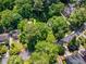 Overhead shot of a home nestled among mature trees, highlighting the large lot and residential neighborhood at 1071 Standard Ne Dr, Brookhaven, GA 30319