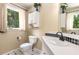 Bright bathroom with tile floors, black and white tile accents, and cabinet storage at 1071 Standard Ne Dr, Brookhaven, GA 30319