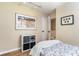 This bedroom features a small closet, a small shelf and hardwood floors at 1071 Standard Ne Dr, Brookhaven, GA 30319