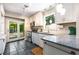 Well-lit kitchen with stainless steel appliances and sleek granite countertops, ideal for cooking enthusiasts at 1071 Standard Ne Dr, Brookhaven, GA 30319