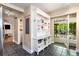 Spacious kitchen with slate tile flooring and access to a screened porch for outdoor dining at 1071 Standard Ne Dr, Brookhaven, GA 30319