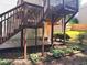 View of backyard and deck, showing multiple outdoor entertaining areas at 2674 Misty Rock Cv, Dacula, GA 30019