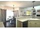 Bright kitchen with a breakfast nook, dark wood floors, modern countertops, and stainless steel appliances at 2674 Misty Rock Cv, Dacula, GA 30019