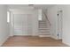Finished basement with updated wood-look floors, built-in storage, and fresh paint at 3735 Benchmark Dr, Atlanta, GA 30349