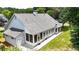 Spacious home exterior showing the yard and multiple windows for lots of natural light at 507 Huntgate Rd, Woodstock, GA 30189