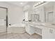Bathroom with double vanity, a bathtub, and a separate shower at 507 Huntgate Rd, Woodstock, GA 30189