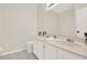 Bright bathroom features a double sink vanity and neutral tile flooring, ready for your design ideas at 507 Huntgate Rd, Woodstock, GA 30189