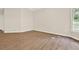Bedroom with hardwood floors and a window with natural light at 507 Huntgate Rd, Woodstock, GA 30189