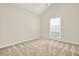 Bright bedroom featuring vaulted ceilings and carpeted floors at 507 Huntgate Rd, Woodstock, GA 30189