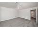 Comfortable bedroom providing new carpet and a ceiling fan at 846 Brandy Oaks Ln, Stone Mountain, GA 30088