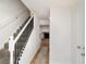Inviting entryway with staircase and wood floors, leading to a bright living area with a fireplace at 846 Brandy Oaks Ln, Stone Mountain, GA 30088