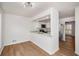Efficient kitchen with white cabinets, stainless steel appliances, and a convenient breakfast bar at 846 Brandy Oaks Ln, Stone Mountain, GA 30088