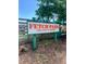 Fetch Park dog park sign with the message Unleash & Unwind at 325 E Paces Ferry Ne Rd # 410, Atlanta, GA 30305