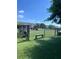 Community dog park with an artificial turf field, benches and fencing at 325 E Paces Ferry Ne Rd # 410, Atlanta, GA 30305