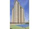 High-rise apartment building with tennis courts, balconies, and landscaped grounds at 325 E Paces Ferry Ne Rd # 410, Atlanta, GA 30305