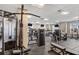 Bright community gym with modern equipment, treadmills, weights, and window views at 325 E Paces Ferry Ne Rd # 410, Atlanta, GA 30305