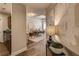 Stylish hallway leading to a bright living area, showcasing modern lighting and elegant decor at 325 E Paces Ferry Ne Rd # 410, Atlanta, GA 30305