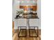 Modern kitchen with stainless appliances, a breakfast bar, and stylish seating at 325 E Paces Ferry Ne Rd # 410, Atlanta, GA 30305