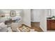 Stylish home office featuring a desk, comfortable seating, and elegant decor next to the hall bathroom at 325 E Paces Ferry Ne Rd # 410, Atlanta, GA 30305