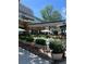 Picturesque outdoor seating area with neatly arranged tables and umbrellas, ideal for a relaxing meal at 325 E Paces Ferry Ne Rd # 410, Atlanta, GA 30305