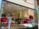 Stylish storefront with large glass windows showcasing fashionable clothing and accessories, attracting shoppers at 325 E Paces Ferry Ne Rd # 410, Atlanta, GA 30305