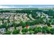 Aerial view highlighting the home's location near North Gwinnett High School, Downtown Sugar Hill, and community amenities at 3980 Suwanee Place Dr, Suwanee, GA 30024