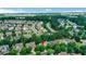 Aerial view highlighting the home's location near North Gwinnett High School, Downtown Sugar Hill, and community amenities at 3980 Suwanee Place Dr, Suwanee, GA 30024