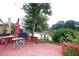 Backyard with a large wooden deck, and a waterfront view at 4000 Longlake Dr, Duluth, GA 30097