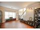 Bright living room with wooden floors, large window, and custom cabinets at 4000 Longlake Dr, Duluth, GA 30097