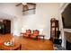 Open living area with two-story ceiling, fireplace, and hardwood floors at 4000 Longlake Dr, Duluth, GA 30097