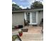 The outdoor deck provides additional space for relaxation or entertaining at 4282 By Pass, Loganville, GA 30052