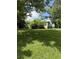 A serene single-story home nestled among mature trees on a sunny lot at 4282 By Pass, Loganville, GA 30052
