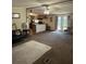 Open floor plan combines the living room and kitchen for a cohesive and inviting space at 4282 By Pass, Loganville, GA 30052